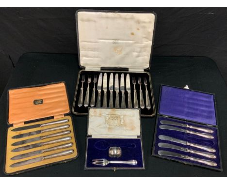 A cased set of six silver hafted dessert knives &amp; forks, Sheffield 1924;  others;  cased part christening set etc (4) 