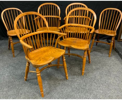 A set of four John Parkin stick back windsor chairs; another pair (6) 