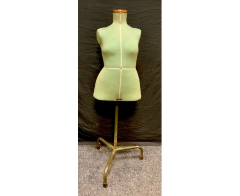 A Mid 20th century Singer dressmakers mannequin, tripod base 