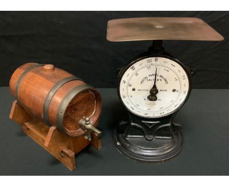 A Sadlers postal parcel balance scale, brass plate, cast iron base, white enamel scale;  a musical spirit barrel (2) 