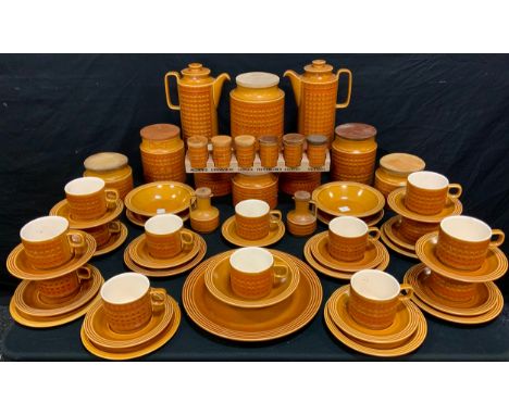 A Hornsea pottery Saffron pattern table service inc spice jars and rack;  assorted storage jars;  coffee pots, cups, saucers,