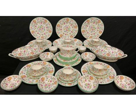 A Minton Haddon Hall pattern six setting dinner and tea set with some spares inc two tier cakes stand, dinner, side plates, o