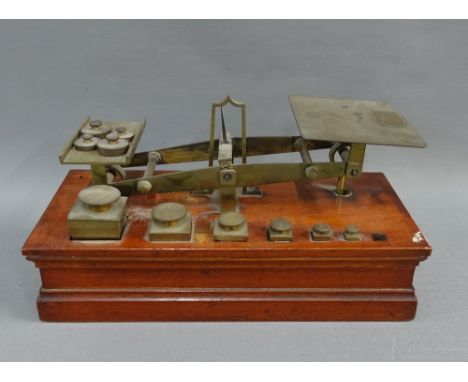 Set of 19th century mahogany and brass Ratcliffe postal scales, 27cm long 