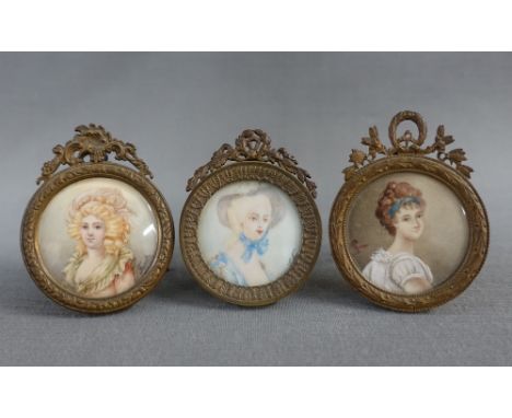 Three portrait miniatures on ivory to include Gaby, Loty and Fausta, contained in circular brass stands with strut backs, siz