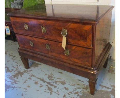 COMMODE, early 19th century German walnut and rosewood crossbanded with two long drawers and later tapering supports, 118cm x