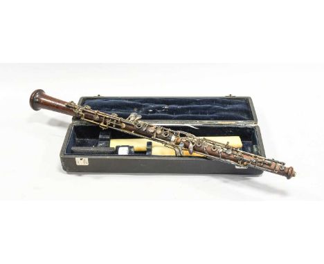 Oboe all joints stamped 'C Mahillon London', rear of bell stamped '716', thumbplate keywork automatic system, casedOverall le