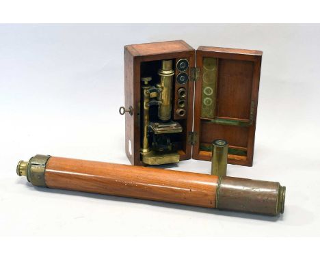 Monocular Microscope on brass stand with two eyepieces and two lenses in mahogany case; together with a Telescope (a.f.) (2)N
