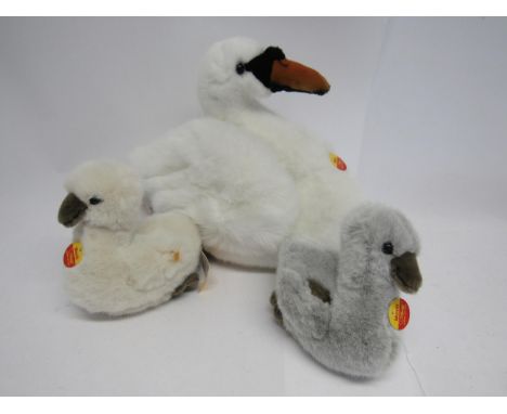 A Steiff 074042 Movi white plush swan, 31cm tall, together with 074004 Movili grey plush cygnet and 074011 Movili white plush