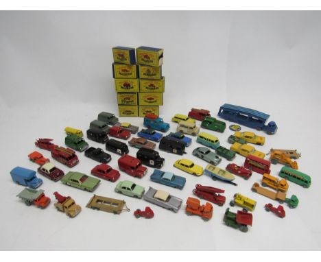 A collection of loose, playworn and repainted Lesney Matchbox Series diecast model vehicles, together with ten empty Moko Les