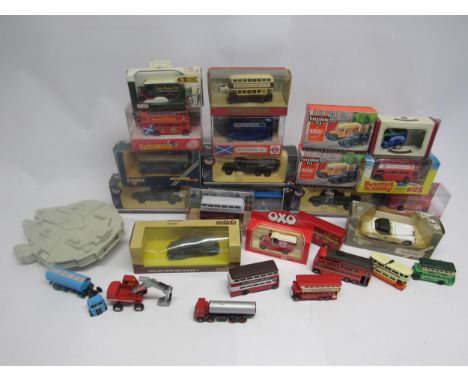 A collection of boxed and loose Solido, Corgi, Matchbox, Lledo and other diecast vehicles, predominantly buses, together with