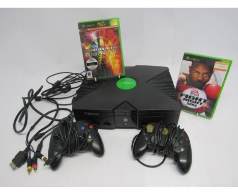 A Microsoft Xbox computer games console with leads, Xbox controller, Mad Catz controller and two games to include Dead Or Ali