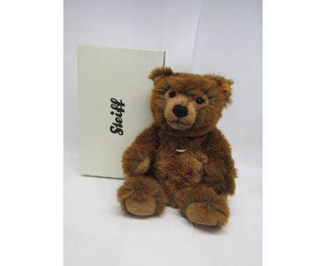 A boxed Steiff 010651 Grizzly Ted articulated teddy bear with button and yellow tag to ear, 42cm tall