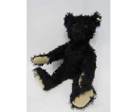 A Steiff limited edition 406829 black mohair Titanic 1912 Replica teddy bear with black plastic eyes, stitched nose and mouth