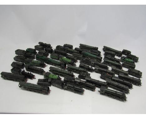 A collection of repainted, modified and damaged 00 gauge model railway lcomotives and tenders for restoration, including Horn