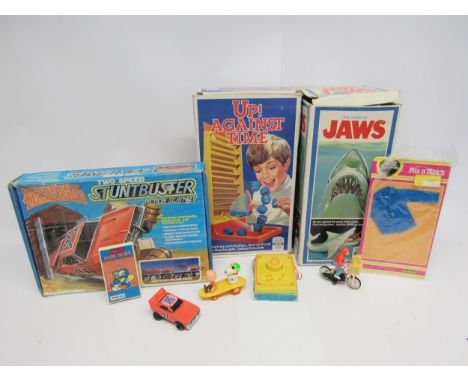 A group of assorted vintage toys and games to include Ideal 'Jaws The Game' and 'Up! Against Time', Knickerbocker 'The Dukes 