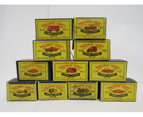 A collection of eleven Moko Lesney Matchbox Series diecast vehicles to include 3 Cement Mixer, 18 Caterpillar Bulldozer (writ