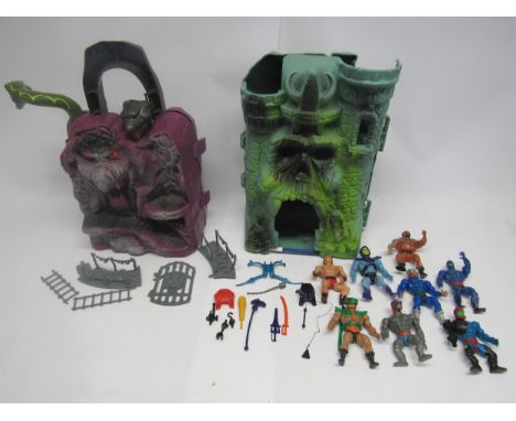 Two vintage Mattel Masters Of The Universe playsets to include Castle Grayskull (damaged) and Snake Mountain, together with s