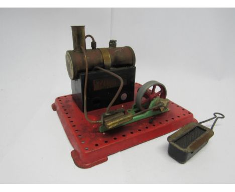 A Mamod live steam stationary engine with horizontal boiler driving single cylinder and flywheel