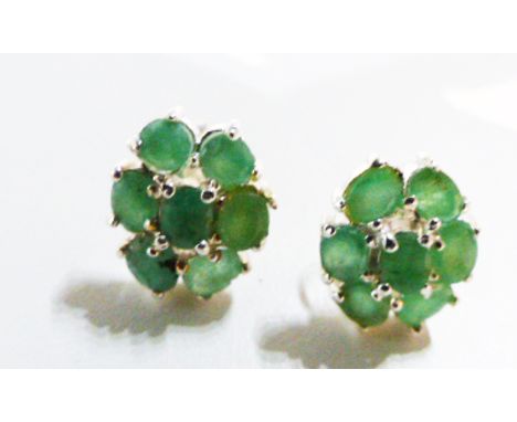 A pair of sterling silver and natural emerald, cluster stud earrings. Dimensions: 1 x 1 cm (2)