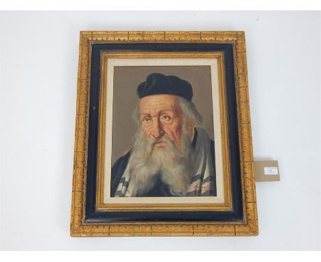 An oil on canvas portrait of a bearded Rabbi, signed indistinctly lower right, sight size 40 x 30cm, in an ebonised and parce