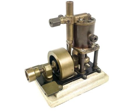 A brass, stream engine model fixed to a rectangular, cast iron base. Dimensions: 16 x 13 cm.