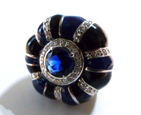 A sterling silver, round, black enamel and blue stone dress ring, Size: P 1/2. 