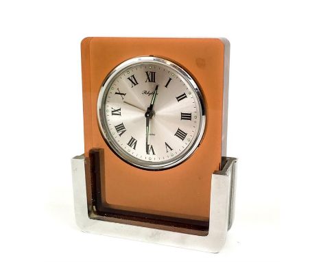A circa 1960s Japanese 'Rhythm' alarm clock, having a mechanical movement, the dial adorned with Roman Numerals, 12.5 x 10 x 