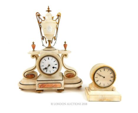 A 19th century alabaster mantel clock, having a classical urn finial (a/f), with Roman Numerals to the enamelled dial, 42 x 3