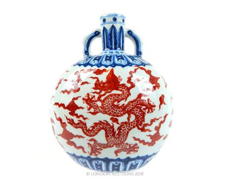 A Chinese, hand-painted, large moon-flask vase, with both sides depicting a writhing, scaled, red  dragon amidst red swirling