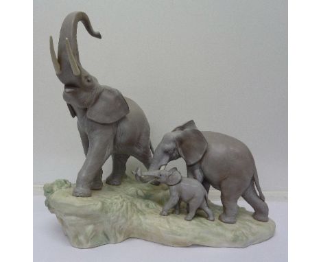 A Lladro figure group, three elephants, width 41cm