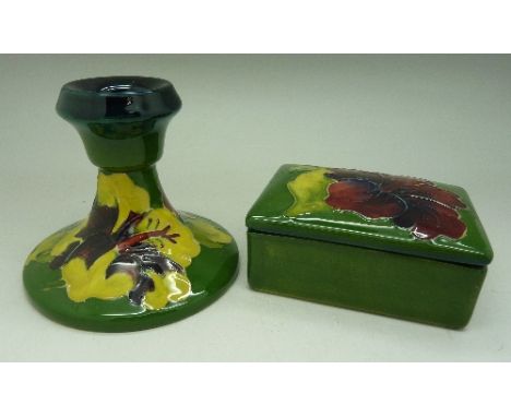 A Moorcroft hibiscus candlestick and a trinket box, height of candlestick 8.5cm