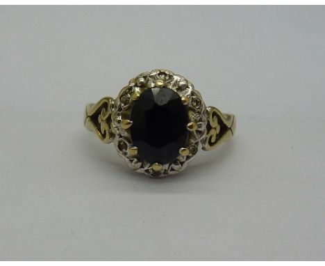 A 9ct gold, sapphire and white stone ring, weight 3g, size K