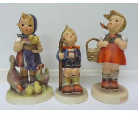 Two Hummel figures, a Goebel figure, a/f