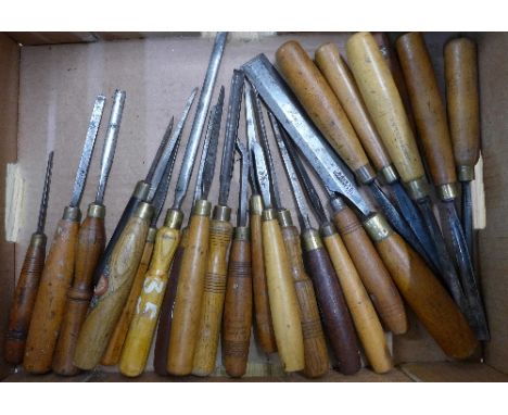 Six Addis carving chisels and gougers, a Sorby chisel and other woodworking carving chisels, twenty-four in total