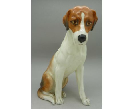 A Royal Worcester model of a dog, 2994, seated hound, height 18cm