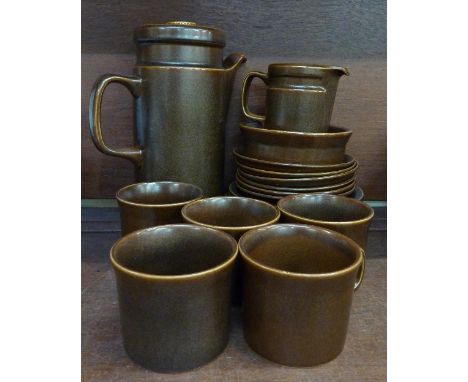 A Wedgwood coffee set comprising coffee pot, a jug and bowl, six plates, six saucers and five cups