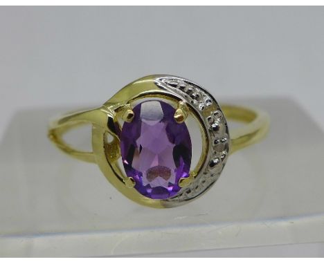 A 9ct gold, amethyst and diamond ring, weight 1.3g, size O