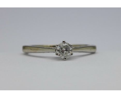 An 18ct white gold, diamond solitaire ring, stamped .31 carat (diamond weight), weight 3.8g, size R½