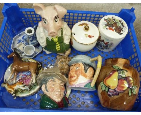 A Royal Doulton medium character jug, The Poacher, D6464, a Wade Nat West pig money bank, a Tunstall vase, a Wade tortoise an