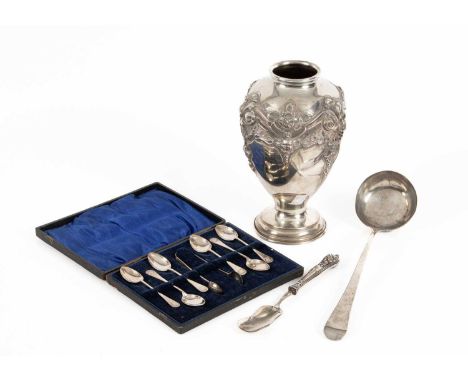 A Portuguese silver vase, baluster shaped on a circular base, repoussé decorated, 23cm high, approximately 438g, a foreign si