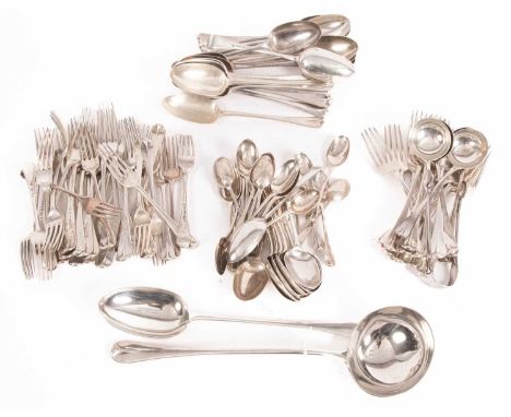 An extensive Victorian rattail pattern silver table service, Robert Garrard, London 1874/1875, comprising twenty tablespoons,