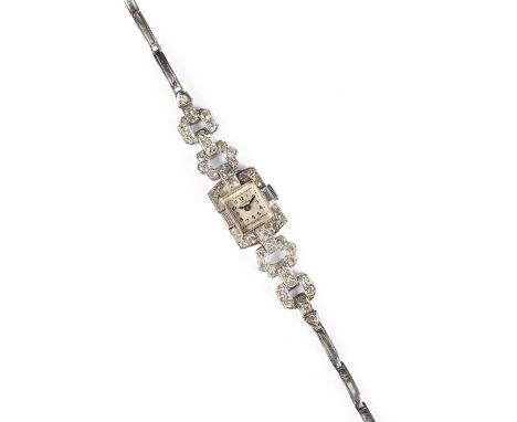 A white gold and diamond Emka cocktail watch, the 9mm rectangular dial with Arabic numerals, the bezel and bracelet set throu