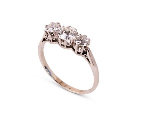 An 18ct white gold and diamond three-stone ring, the central old cut diamond approximately 1ct, flanked by two smaller old cu
