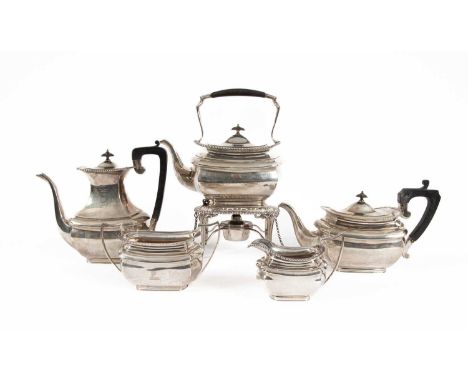 An Edwardian five-piece silver tea and coffee service, Elkington &amp; Co Ltd., Birmingham 1903-1906, of oblong form with gad