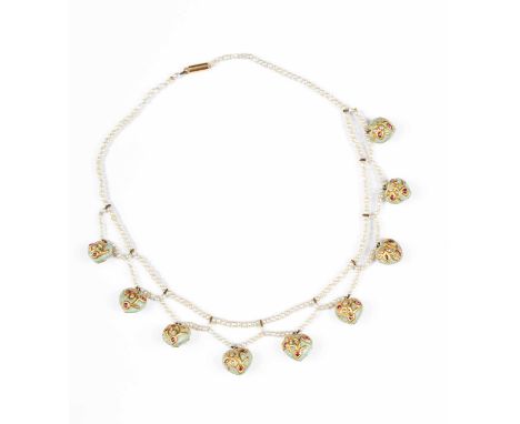 A seed pearl fringe necklace, suspending nine heart-shaped turquoise drops, applied with high carat gold foliate detail, set 