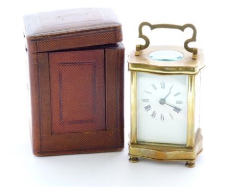 Cylinder carriage clock in ogee case with travel case.