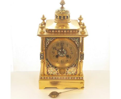 French eight day mantel clock for Russell, the gilt concave dial with cloisonne enameled centre in ormolu case with cloisonne