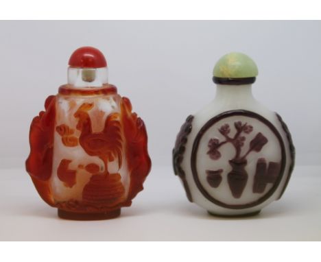 19th century Chinese snuff bottle, the  purple overlay on white ground carved with 'precious objects' and taotie masks to sid