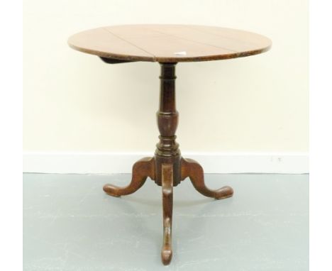 18th century circular tilt top tripod table, baluster column on three splayed feet. 72cm high x 70cm dia