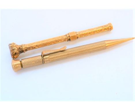 Victorian gold engraved propelling pencil, hexagonal, engraved, with sardonyx end and another engine turned. 9ct. (2). 